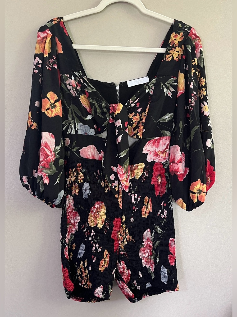 Magnolia black red smocked puff sleeves floral tie front romper size small